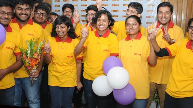 Students selected in IIT-JEE Advance test celebrate their results outside a coaching institute in Ranchi, on June 10.(Diwakar Prasad/ HT File Photo)