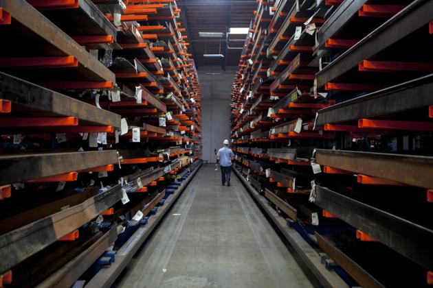 An employee retrieves beams of steel at Industrial Metal Supply Co.'s warehouse in San Diego, California, US. (Sam Hodgson/Bloomberg) An employee retrieves beams of steel at Industrial Metal Supply Co.'s warehouse in San Diego, California, US. (Sam Hodgson/Bloomberg)