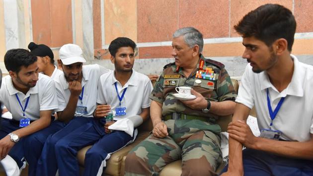 Chief of Army Staff, General Bipin Rawat interacts with students from Jammu and Kashmir on National Integration/Educational Tour organised by the Army, in New Delhi. “Our basic purpose is to go after terrorists who create violence and disturbance in the Valley. Our aim is not to cause inconvenience to civilian population who are not indulging in arson or violence,” Rawat said. (PTI)