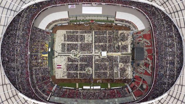 Supporters of presidential candidate Andres Manuel Lopez Obrador, of the MORENA party, fill Azteca stadium as they wait for him to arrive for his closing campaign rally in Mexico City. Mexico will choose a new president in general elections on July 1. (Christian Palma / AP) 