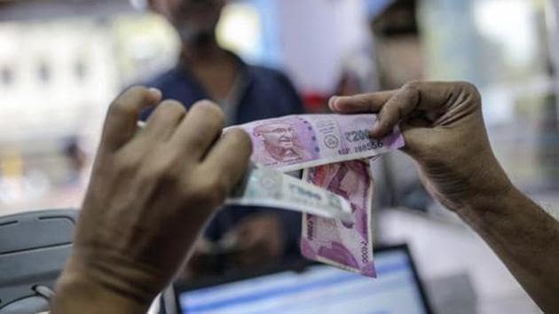 Selling of dollars by banks and exporters on Friday made the greenback weak against some currencies overseas, which supported the rupee, forex dealers said. (Dhiraj Singh/Bloomberg)