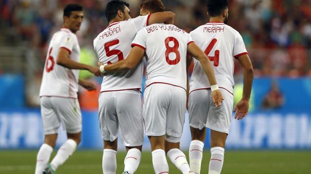 Tunisia's Fakhreddine Ben Youssef (8) celebrates with his teammates after scoring his side's first goal during the group G match between Panama and Tunisia at the 2018 football World Cup. (AP)