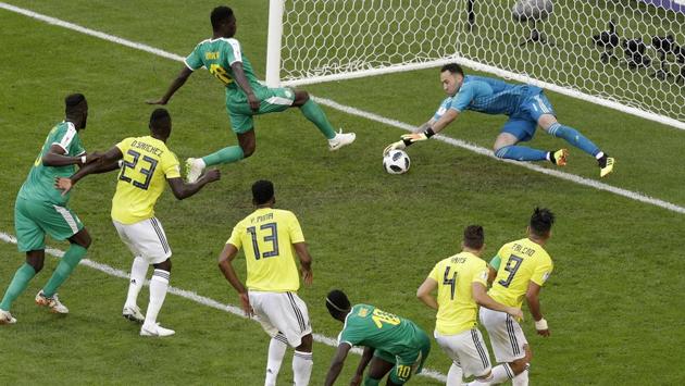 Colombia goalkeeper David Ospina made some brilliant saves to help the South American outfit top Group H with six points. (AP) Colombia goalkeeper David Ospina made some brilliant saves to help the South American outfit top Group H with six points. (AP)