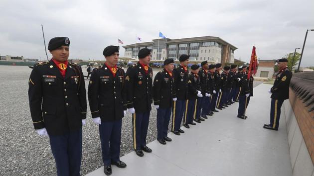 US Army soldiers stand as they wait for an opening ceremony for the new headquarters of the US Forces Korea (USFK) at Camp Humphreys in Pyeongtaek, South KoreaSe(AP Photo) US Army soldiers stand as they wait for an opening ceremony for the new headquarters of the US Forces Korea (USFK) at Camp Humphreys in Pyeongtaek, South KoreaSe(AP Photo)
