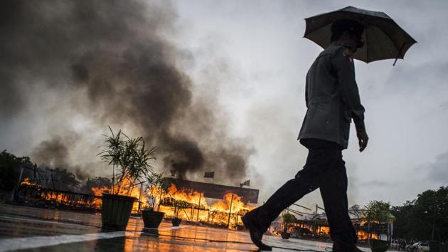Myanmar law enforcement authorities burn seized illegal drugs worth 187 million USD, marking the International Day against Drug Abuse and Illicit Trafficking during a ceremony in Yangon. (Ye Aung Thu / AFP) 