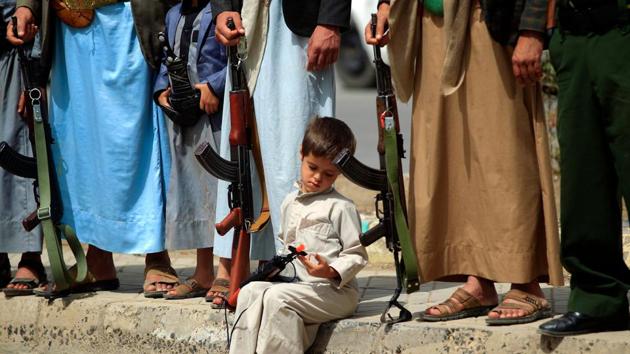 Supporters of the Shiite Yemeni Houthis demonstrate in the capital Sanaa, in support of fellow Houthis engaged in battles against the coalition forces led by the UAE and Saudi Arabia in the Red Sea port city of Hudeida. (Muhammed Huwais / AFP) 