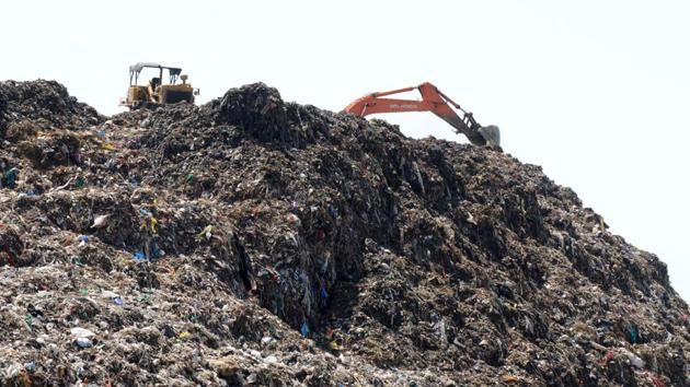 Bandhwari landfill in Gurugram, India. Between 800 to 1,000 trucks visit the site every day, and dump over a 1,000 tonnes of garbage from Gurugram and Faridabad. (Praveen Kumar/ HT) Bandhwari landfill in Gurugram, India. Between 800 to 1,000 trucks visit the site every day, and dump over a 1,000 tonnes of garbage from Gurugram and Faridabad. (Praveen Kumar/ HT)