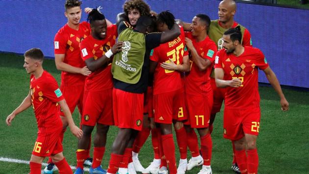 Belgium's Adnan Januzaj celebrates scoring their first goal with Marouane Fellaini and team mates. (REUTERS)