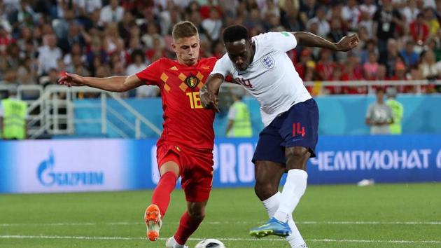England's Danny Welbeck shoots at goal as Belgium's Thorgan Hazard pressures. (REUTERS)