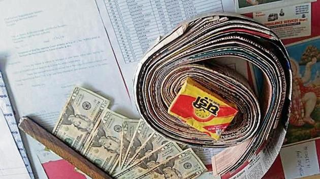 The duo allegedly struck a deal with the drug store owner for exchanging 1,834 bills, of $20 denomination, in return for ₹5 lakh. (Photo for representation) The duo allegedly struck a deal with the drug store owner for exchanging 1,834 bills, of $20 denomination, in return for ₹5 lakh. (Photo for representation)