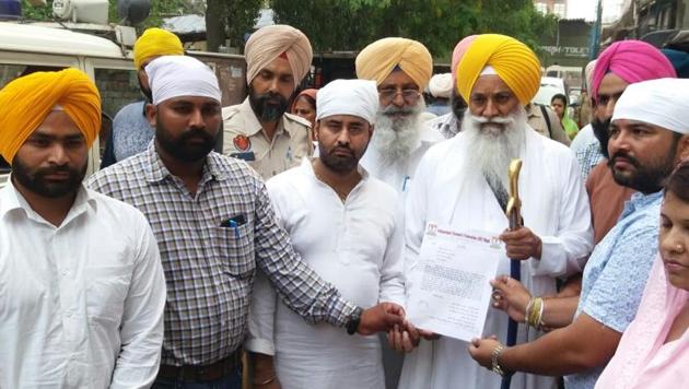 ISF leaders submitting the complaint on Saturday.(HT Photo)