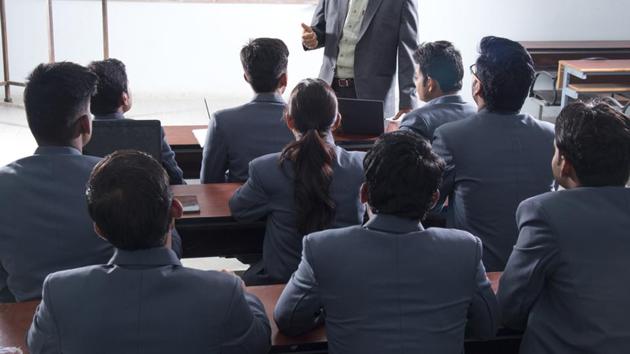 The owner of the coaching institute allegedly assaulted Mayadhar Mohapatra and garlanded him with shoes after he stopped coming to his institution to teach. (Shutterstock/Representative image) The owner of the coaching institute allegedly assaulted Mayadhar Mohapatra and garlanded him with shoes after he stopped coming to his institution to teach. (Shutterstock/Representative image)