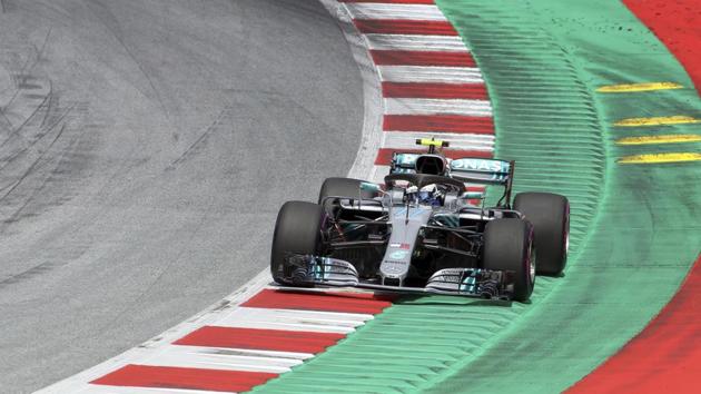 Mercedes driver Valtteri Bottas of Finland takes a curve during the qualifying session for the Austrian Formula One Grand Prix at the Red Bull Ring racetrack.(AP)