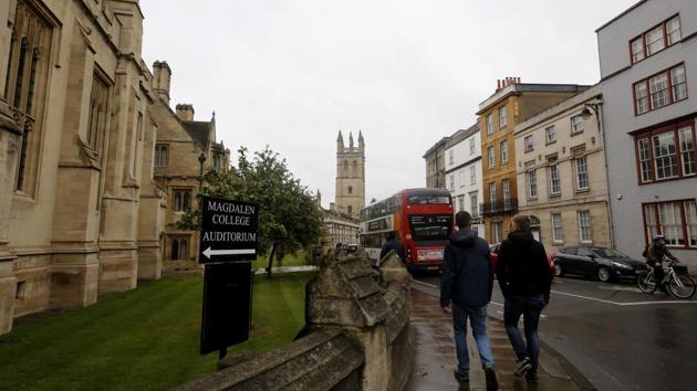 People walk around Oxford University's campus in Oxford, England. (AP File Photo) People walk around Oxford University's campus in Oxford, England. (AP File Photo)