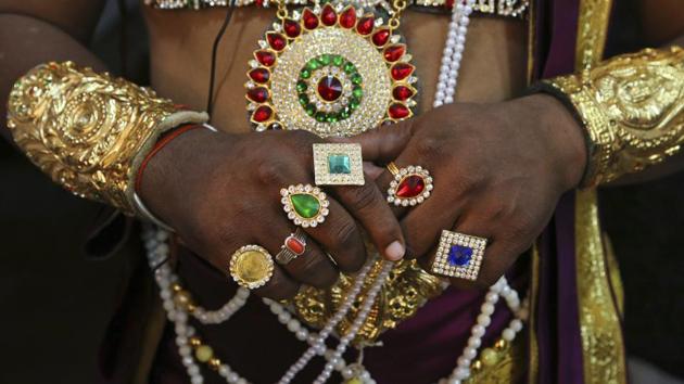 An actor dressed as Dasharatha, one of the characters of the Hindu epic Ramayana waits backstage to perform at a theatre in Bangalore on June 29, 2018. (Aijaz Rahi / AP) An actor dressed as Dasharatha, one of the characters of the Hindu epic Ramayana waits backstage to perform at a theatre in Bangalore on June 29, 2018. (Aijaz Rahi / AP)