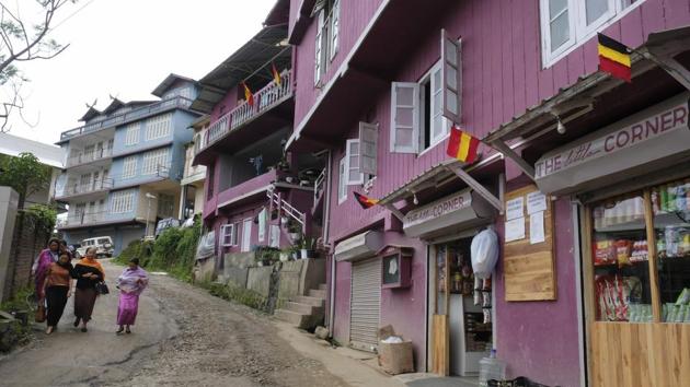 Naga women walk past houses decked with flags of various FIFA World Cup participating nations, in Kohima. In this part of India, there’s no messing about when it comes to football. In towns and villages, the flags of Argentina, Brazil, Germany and Spain fly above concrete homes. Banners proclaiming “Welcome to Russia” welcome visitors. Entire houses go to bed without dinner, upset after team losses. (Yirmiyan Arthur / AP) Naga women walk past houses decked with flags of various FIFA World Cup participating nations, in Kohima. In this part of India, there’s no messing about when it comes to football. In towns and villages, the flags of Argentina, Brazil, Germany and Spain fly above concrete homes. Banners proclaiming “Welcome to Russia” welcome visitors. Entire houses go to bed without dinner, upset after team losses. (Yirmiyan Arthur / AP)