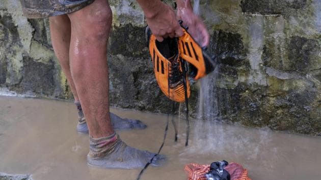Kheto Rhosu, 21, washes his football boots after a game with friends in Kigwema. “Soccer was the first game we were introduced to,” says the 34-year-old Longrangty Longchar. “The World Cup is more like an important religious event.” Another Kohima resident, Sophy Lasuh Kesiezie, loves how she can tell when someone scores by the screams and shouts that rattle through town. (Yirmiyan Arthur / AP) Kheto Rhosu, 21, washes his football boots after a game with friends in Kigwema. “Soccer was the first game we were introduced to,” says the 34-year-old Longrangty Longchar. “The World Cup is more like an important religious event.” Another Kohima resident, Sophy Lasuh Kesiezie, loves how she can tell when someone scores by the screams and shouts that rattle through town. (Yirmiyan Arthur / AP)