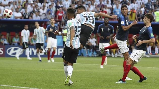 Argentina's Sergio Aguero, center, scores his side's third goal but it proved to be a mere consolation. (AP) Argentina's Sergio Aguero, center, scores his side's third goal but it proved to be a mere consolation. (AP)