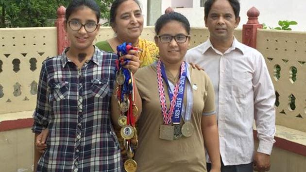 Vidushi Varshney (second from right) with her parents and sister. (HT Photo) Vidushi Varshney (second from right) with her parents and sister. (HT Photo)