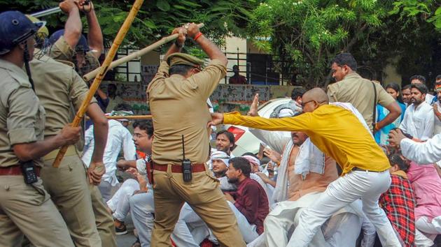 Police baton charge on Congress party's youth wing activists during their ‘Save India’ protest against the BJP government in Lucknow on June 26, 2018. (PTI) Police baton charge on Congress party's youth wing activists during their ‘Save India’ protest against the BJP government in Lucknow on June 26, 2018. (PTI)