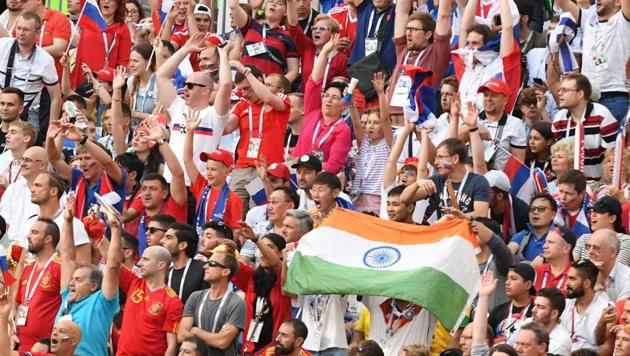 A fan waves an Indian flag during the World Cup match between Russia and Spain. (Utpaal SORKKAR/HT Photo)