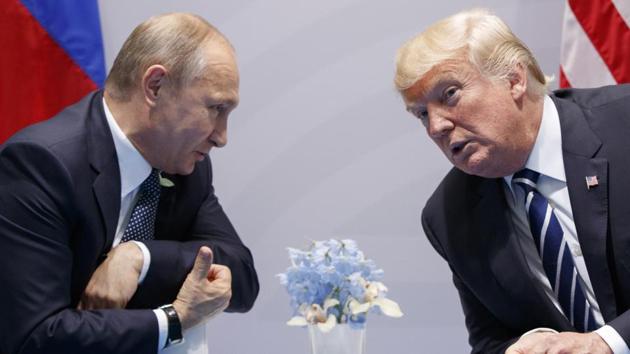US president Donald Trump meets with Russian president Vladimir Putin at the G-20 Summit in Hamburg in July 2017. The two presidents will meet at summit Finland’s Helsinki on July 16, 2018. (AP) US president Donald Trump meets with Russian president Vladimir Putin at the G-20 Summit in Hamburg in July 2017. The two presidents will meet at summit Finland’s Helsinki on July 16, 2018. (AP)