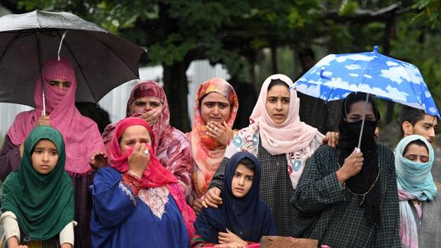 Villagers during the funeral procession of Faizan Ahmed in Pulwama district of Kashmir on Saturday. (PTi) Villagers during the funeral procession of Faizan Ahmed in Pulwama district of Kashmir on Saturday. (PTi)