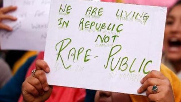 The woman, in her complaint, alleged she was intercepted by an SUV and forced inside the vehicle by four masked men. Two of the men allegedly raped her while the other two filmed the incident. The woman said the clip was later used to blackmail her. (Reuters File Photo) The woman, in her complaint, alleged she was intercepted by an SUV and forced inside the vehicle by four masked men. Two of the men allegedly raped her while the other two filmed the incident. The woman said the clip was later used to blackmail her. (Reuters File Photo)