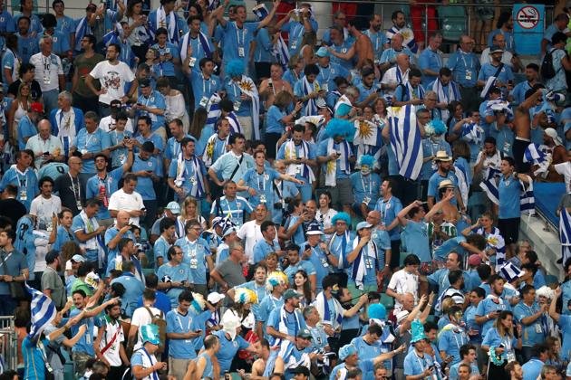 Uruguay fans celebrate at the end of the match. (REUTERS) Uruguay fans celebrate at the end of the match. (REUTERS)