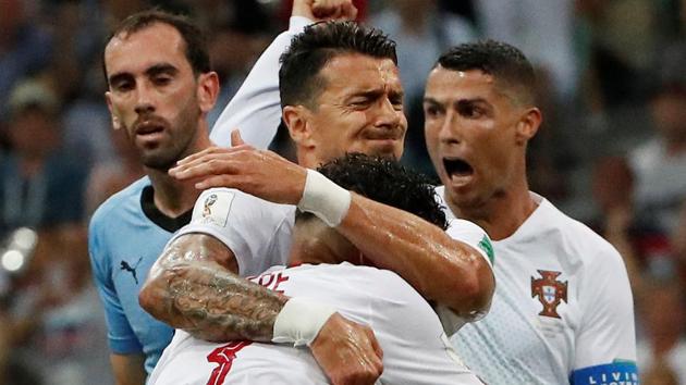 Portugal's Pepe celebrates scoring their first goal with team mates. (REUTERS) Portugal's Pepe celebrates scoring their first goal with team mates. (REUTERS)