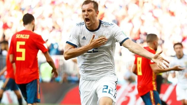Russia's Artem Dzyuba celebrates scoring their first goal. (REUTERS)