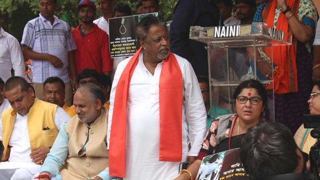 Mukul Roy and other BJP activists protests against killing of party workers in Bengal at Rajghat in New Delhi on July 2. (Vijul Narang/HT PHOTO) Mukul Roy and other BJP activists protests against killing of party workers in Bengal at Rajghat in New Delhi on July 2. (Vijul Narang/HT PHOTO)