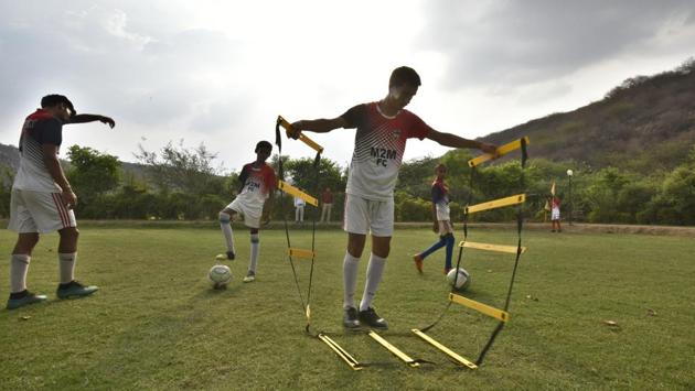 Over the next few days, Raghav, a famous cricketer in his area, and his pupils donated their cricket bats to youngsters in a neighbouring village. Spurred on by Raghav, the villagers pooled funds — about ₹ 3 lakh — and bought football gear and equipment such as gloves, net, goal posts, ladder, markers, and corner flags. (Raj K Raj / HT Photo) Over the next few days, Raghav, a famous cricketer in his area, and his pupils donated their cricket bats to youngsters in a neighbouring village. Spurred on by Raghav, the villagers pooled funds — about ₹ 3 lakh — and bought football gear and equipment such as gloves, net, goal posts, ladder, markers, and corner flags. (Raj K Raj / HT Photo)