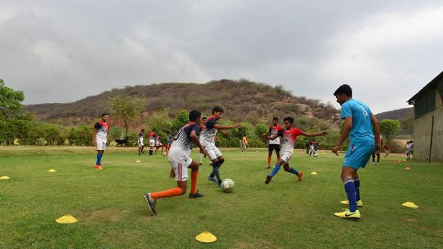 The village’s cricket ground was converted into a football field. “We got our initial training from YouTube,” says Yashvir, 18. And two years back, players from the village also formed a club — M2M football club — with its own logo and jerseys. (Raj K Raj / HT Photo) The village’s cricket ground was converted into a football field. “We got our initial training from YouTube,” says Yashvir, 18. And two years back, players from the village also formed a club — M2M football club — with its own logo and jerseys. (Raj K Raj / HT Photo)