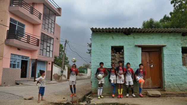 In a short span of time, the once cricket-crazy village has produced footballers who have played both at the state and national level and also in the Youth I- League for clubs such as Delhi United. There is hardly a youngster in the village without a football — and one can see many of them dribbling a ball in its well-paved streets. (Raj K Raj / HT Photo) In a short span of time, the once cricket-crazy village has produced footballers who have played both at the state and national level and also in the Youth I- League for clubs such as Delhi United. There is hardly a youngster in the village without a football — and one can see many of them dribbling a ball in its well-paved streets. (Raj K Raj / HT Photo)