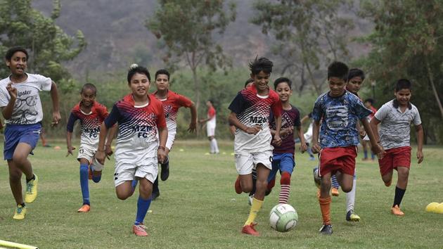 It’s been four years at Haryana’s Ghamroj village since its young cricketers switched allegiances to football. Coach Mahesh Raghav recalls how none of his 50 trainees turned up one cloudy evening in June 2014 –around the time of the FIFA World Cup –a first in his 10 years of coaching the village’s players, and a turning point in both their lives. (Raj K Raj / HT Photo) It’s been four years at Haryana’s Ghamroj village since its young cricketers switched allegiances to football. Coach Mahesh Raghav recalls how none of his 50 trainees turned up one cloudy evening in June 2014 –around the time of the FIFA World Cup –a first in his 10 years of coaching the village’s players, and a turning point in both their lives. (Raj K Raj / HT Photo)