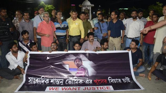 This September 20, 2017 photo shows journalists at a road blockade set up over the killing of journalist Shantanu Bhowmick in front of the chief minister's residence in Agartala. (AFP File Photo) This September 20, 2017 photo shows journalists at a road blockade set up over the killing of journalist Shantanu Bhowmick in front of the chief minister's residence in Agartala. (AFP File Photo)