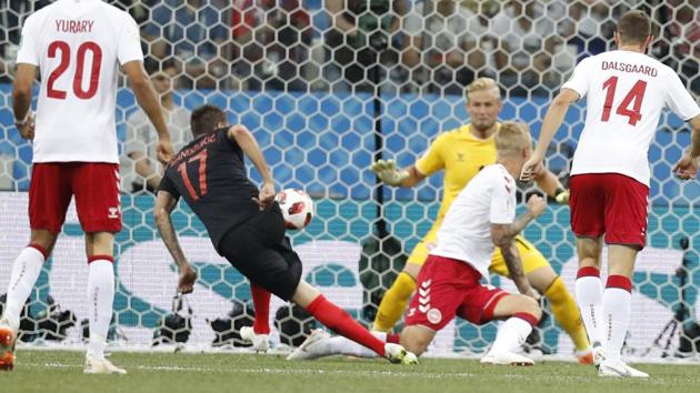Croatia's Mario Mandzukic, second from left, scores his side's first goal during the round of 16 match. (AP) 