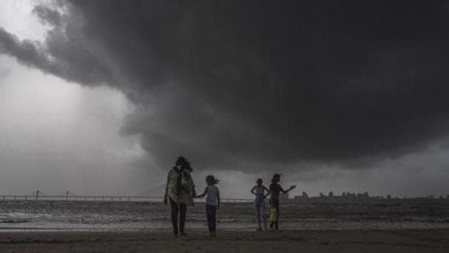 Dark monsoon clouds hover over Bandra worli sealing seen from Dadar chowpatty in Mumbai, India. (Pratik Chorge/HT Photo) Dark monsoon clouds hover over Bandra worli sealing seen from Dadar chowpatty in Mumbai, India. (Pratik Chorge/HT Photo)