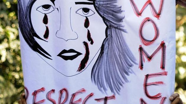 Protestors hold a placard with a message against rape in New Delhi.(HT File Photo) Protestors hold a placard with a message against rape in New Delhi.(HT File Photo)