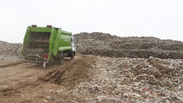 With an estimated population of more than two million people, Gurugram generates an average of 900 metric tons of waste per day, most of which end up in the Bandhwari landfill. This towering landfill located only 20kms from the city has triggered a public health crisis in the surrounding villages, degrading local air, water and soil, and altering the social fabric of the community. (Yogendra Kumar / HT Photo)