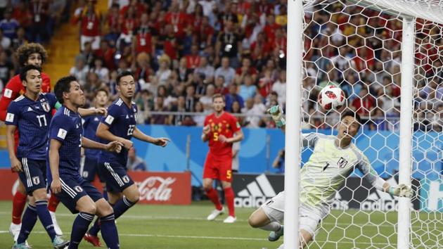 Japan goalkeeper Eiji Kawashima, right, fails to save a ball as Belgium's Jan Vertonghen scores his first side's goal during the round of 16 match between Belgium and Japan. (AP) Japan goalkeeper Eiji Kawashima, right, fails to save a ball as Belgium's Jan Vertonghen scores his first side's goal during the round of 16 match between Belgium and Japan. (AP)