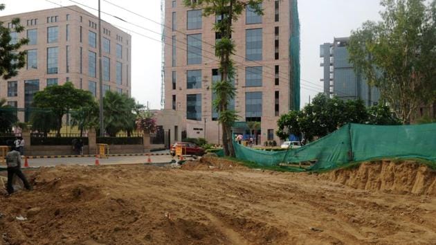 GMDA authorities have called representatives of Google India Pvt Ltd and realty firm Unitech for a hearing over the issue of destruction of the green belt outside the Google office.(Parveen Kumar/ HT Photo)