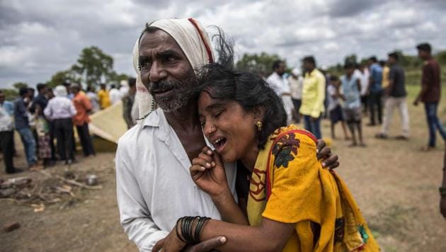 Sangeeta Bhosale mourns the death of her family members who were killed in a horrifying mob attack on Sunday on suspicion of being part of a child-kidnapping gang at Rainpada Village in Dhule on July 2. (HT Photo/Satish Bate) Sangeeta Bhosale mourns the death of her family members who were killed in a horrifying mob attack on Sunday on suspicion of being part of a child-kidnapping gang at Rainpada Village in Dhule on July 2. (HT Photo/Satish Bate)