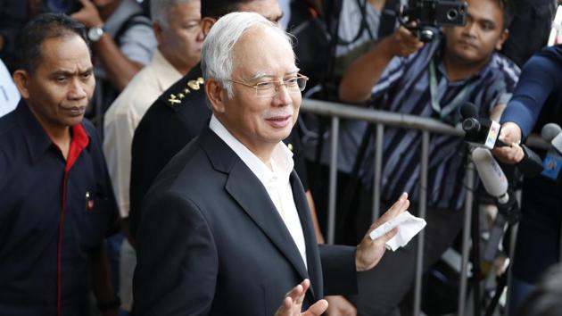 In this photo taken Thursday, May 24, 2018, former Malaysian Prime Minister Najib Razak, center, speaks to media as he leaves the Malaysian Anti-Corruption Commission (MACC) Office in Putrajaya in Kuala Lumpur.(AP)