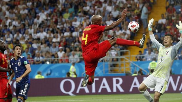 Players watching Belgium's Vincent Kompany jumping with the ball in front of Japan goalkeeper Eiji Kawashima during the round of 16 match between Belgium and Japan. (AP) Players watching Belgium's Vincent Kompany jumping with the ball in front of Japan goalkeeper Eiji Kawashima during the round of 16 match between Belgium and Japan. (AP)