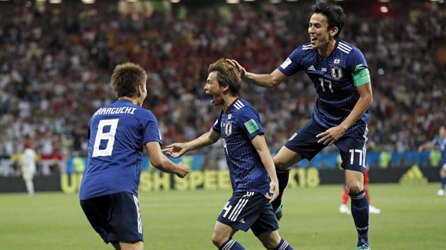 Japan's Takashi Inui, center, celebrates with Japan's Genki Haraguchi, left, and Japan's Makoto Hasebe, right, after scoring his side's second goal. (AP) Japan's Takashi Inui, center, celebrates with Japan's Genki Haraguchi, left, and Japan's Makoto Hasebe, right, after scoring his side's second goal. (AP)