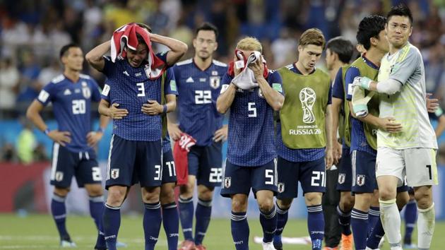 Japan's sad players walk on the pitch after losing the round of 16 match between Belgium and Japan at the 2018 soccer World Cup in the Rostov Arena. (AP) Japan's sad players walk on the pitch after losing the round of 16 match between Belgium and Japan at the 2018 soccer World Cup in the Rostov Arena. (AP)