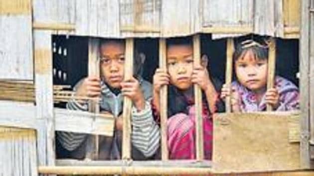 Over 35,000 Bru tribals, who took refuge in Tripura in 1997 following ethnic violence in Mizoram, remain stranded in seven camps in Kanchanpur, North Tripura.(Burhaan Kinu/HT)