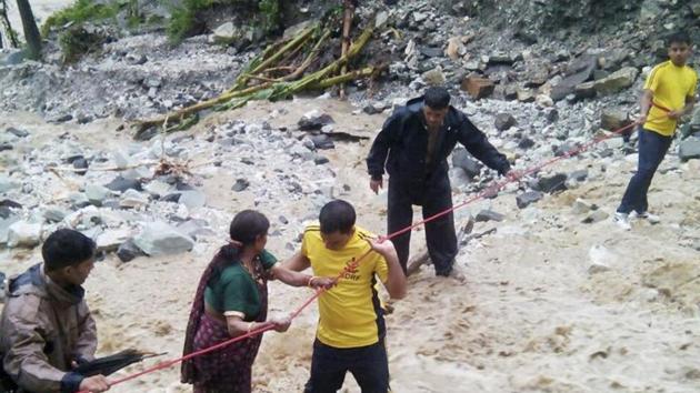 SDRF personnel conducting rescue operations after heavy rains in Uttarakhand, India. (HT File Photo) SDRF personnel conducting rescue operations after heavy rains in Uttarakhand, India. (HT File Photo)